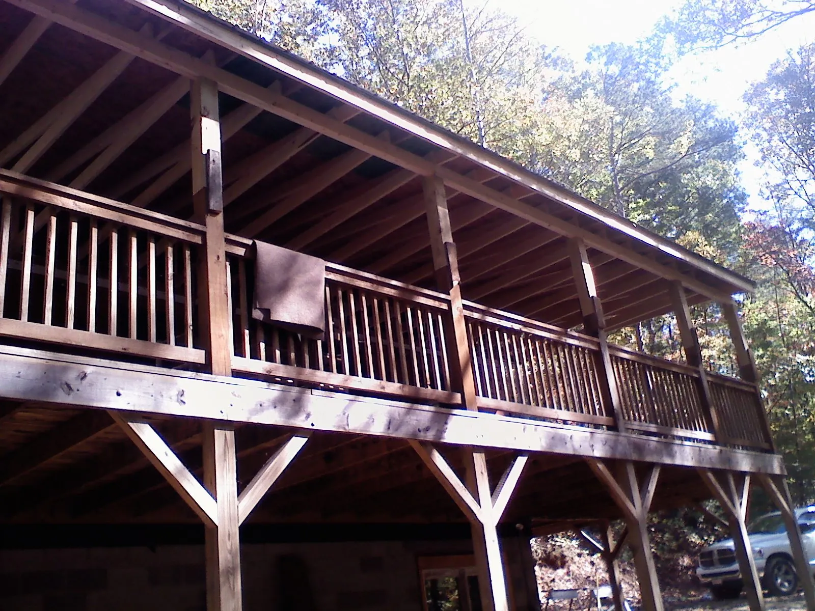 Timber framing under a new elevated porch and deck — Roof Leak Repair in Montreat by Roofing Brothers